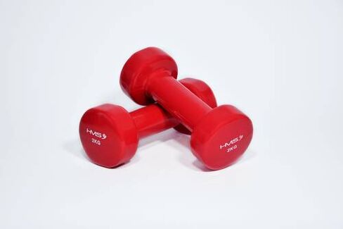 Basic exercises for breast augmentation are performed with dumbbells
