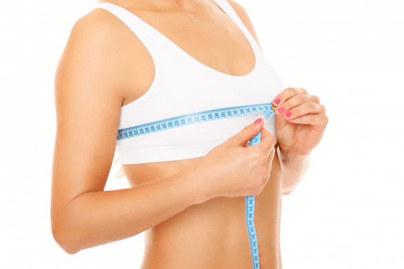measuring breast size with a centimeter
